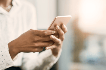 Business woman on smartphone