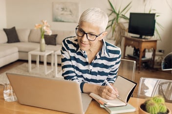 Woman on laptop in video interview