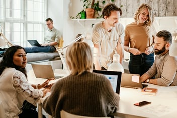Team members working together in office