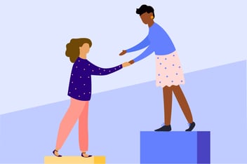 one woman helping another up a step