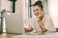 woman looking at a laptop