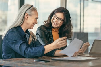 Two women working together in an office