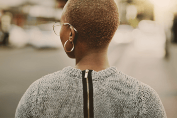 Woman looking out into street