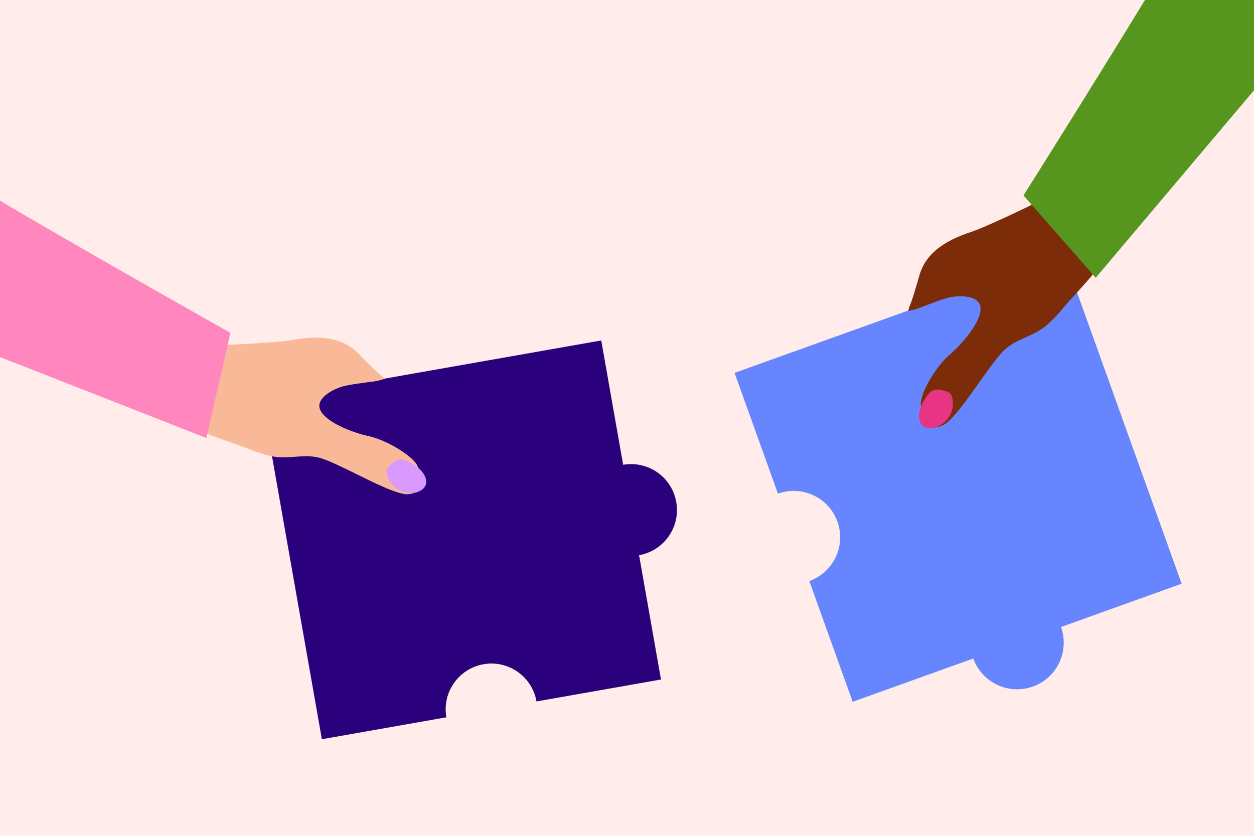two people fitting together puzzle pieces